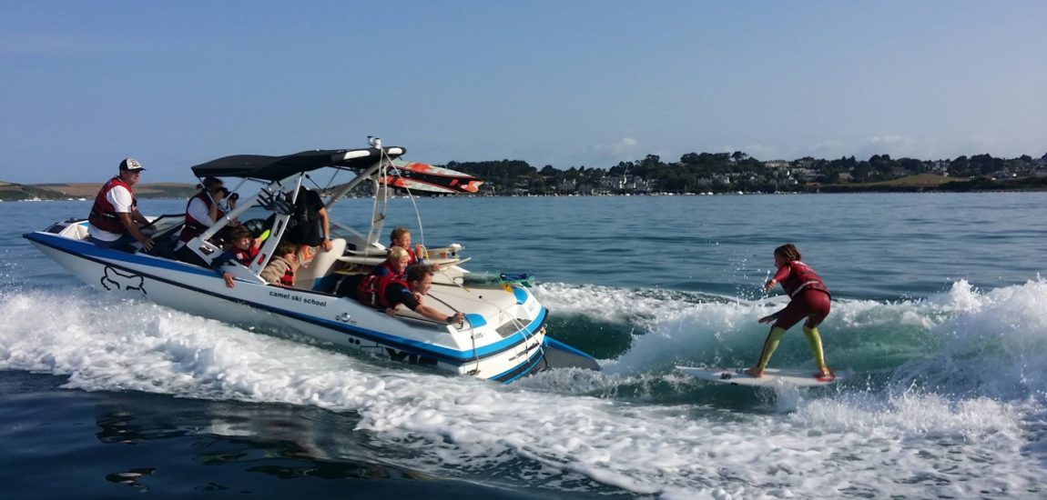 A wakesurf session underway with Camel Ski School. Water sports on the camel estuary are a common sight.