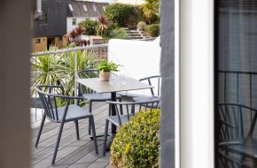 Outdoor terrace with furniture at Anchor House, Rock